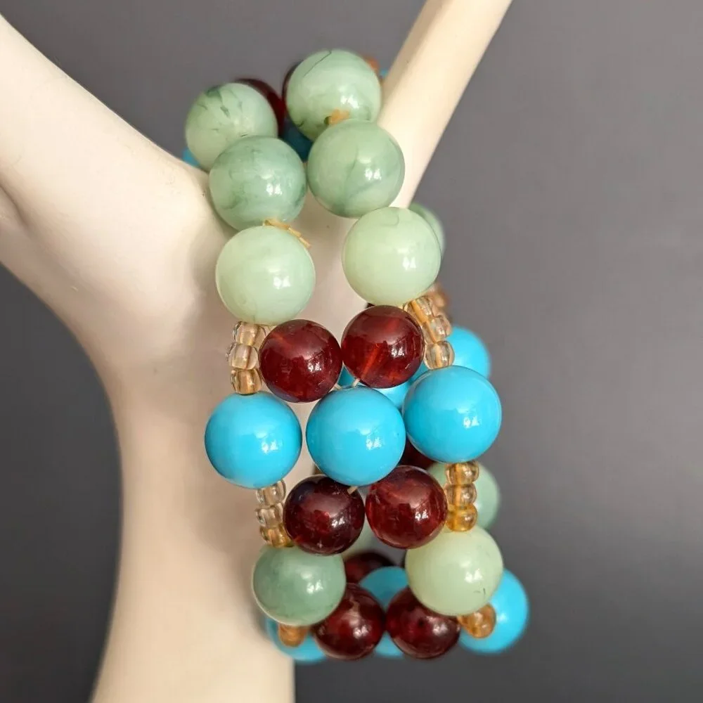 Blue, amber, green and pale yellow beaded stretch bracelet